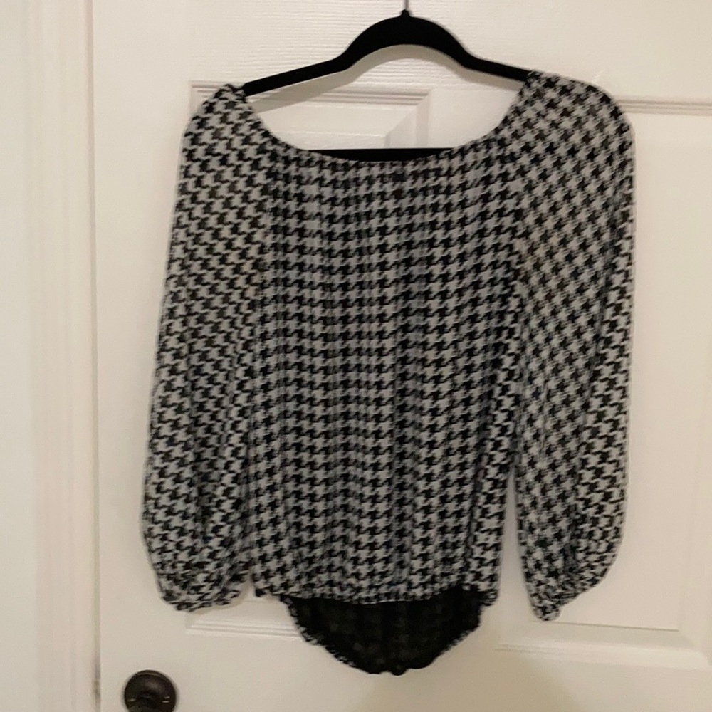 An off the shoulder top with an adorable pattern
